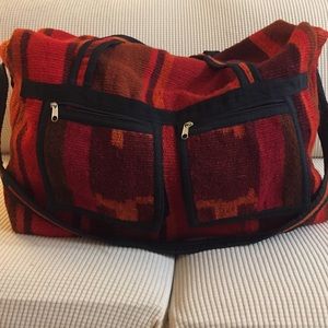 Large woven duffle bag, like new condition